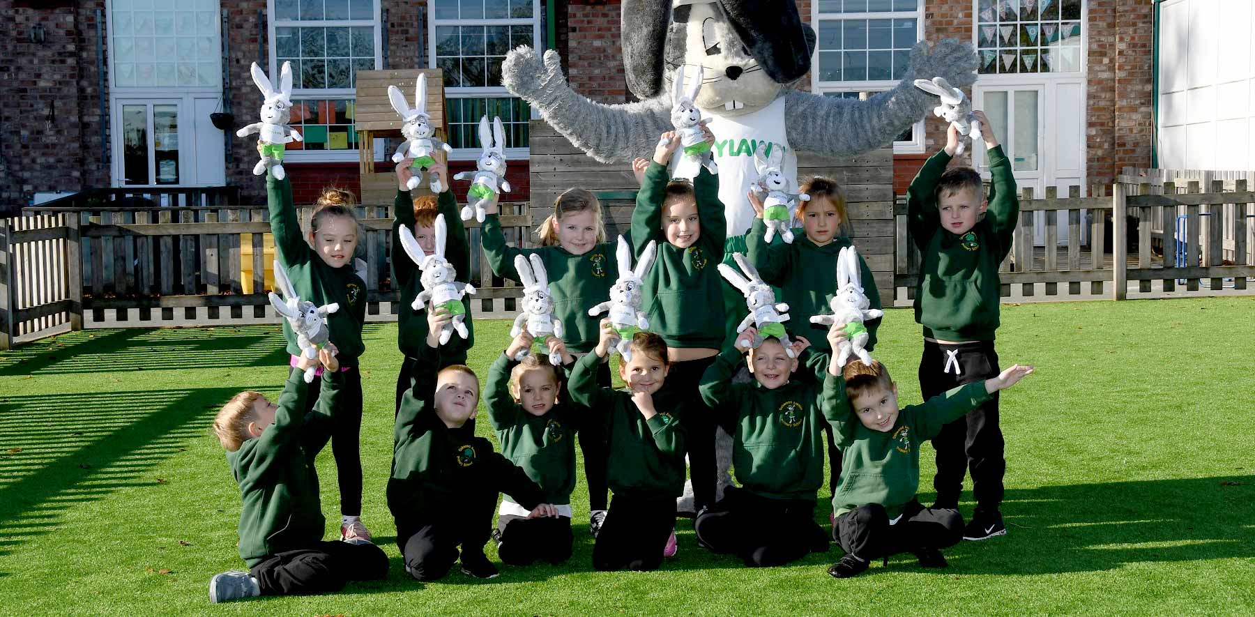 School children at Oakwood Primary School on their LazyLawn